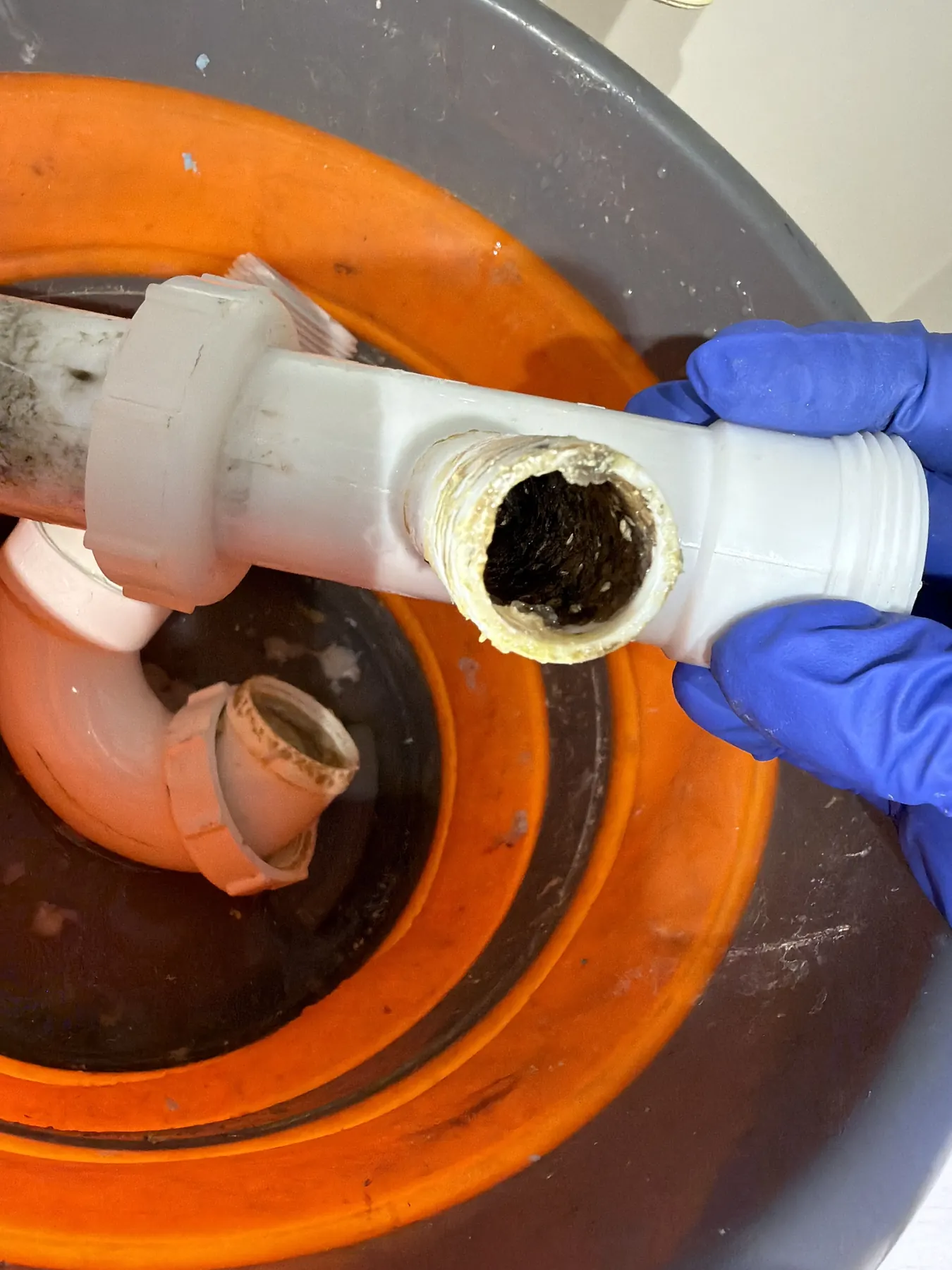 Drain line cleaned and checked after a condensate tie-in blockage.
