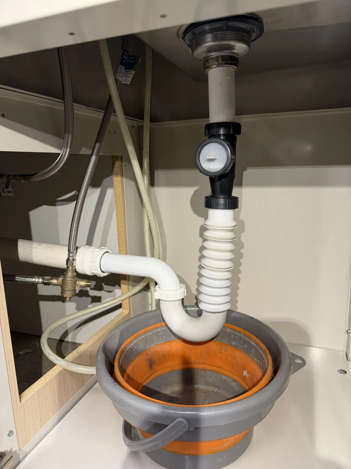 Commercial wash-table drain cleared and old corrugated piping replaced.