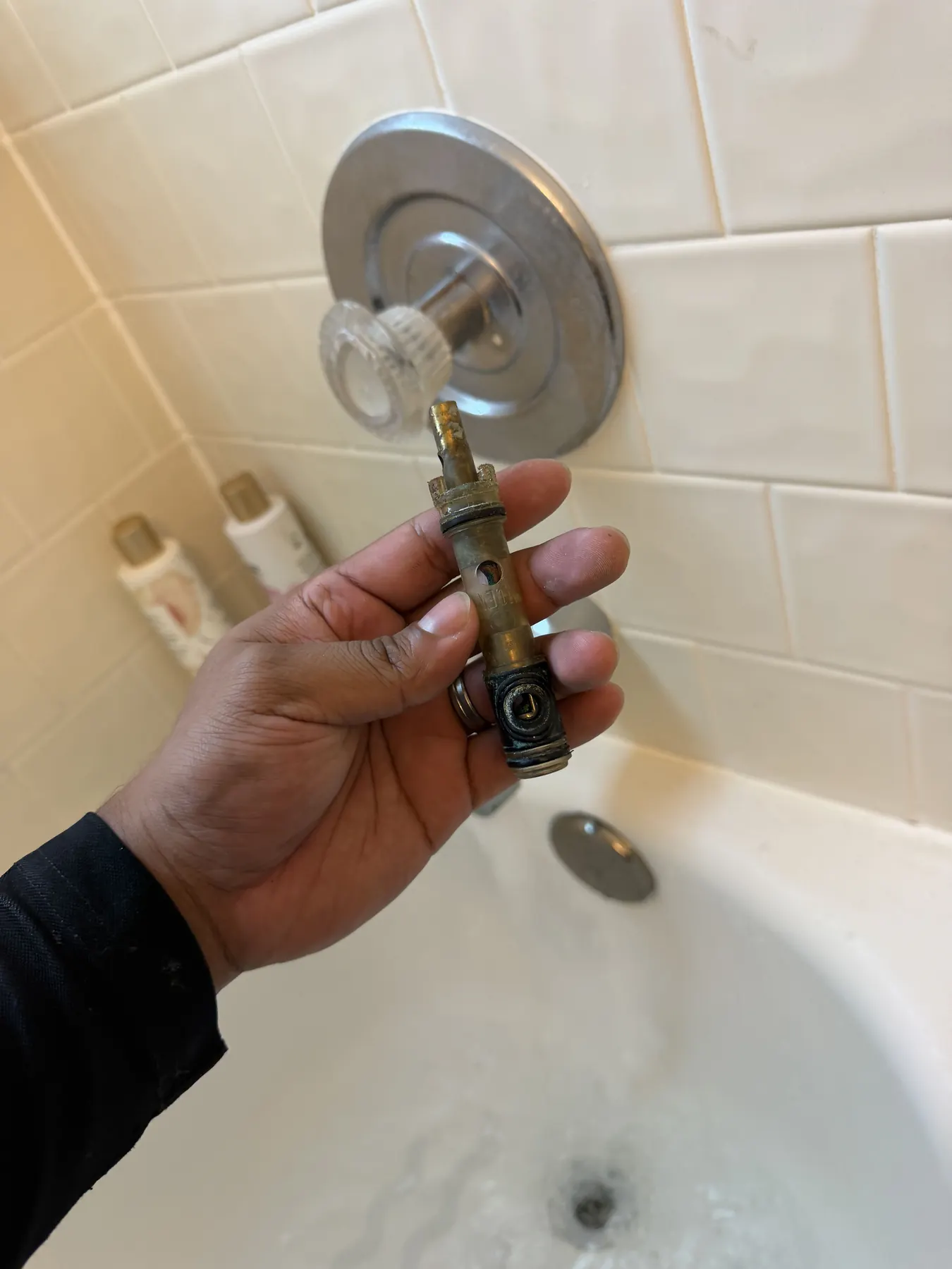 Shower handle and cartridge serviced to resolve a leak.